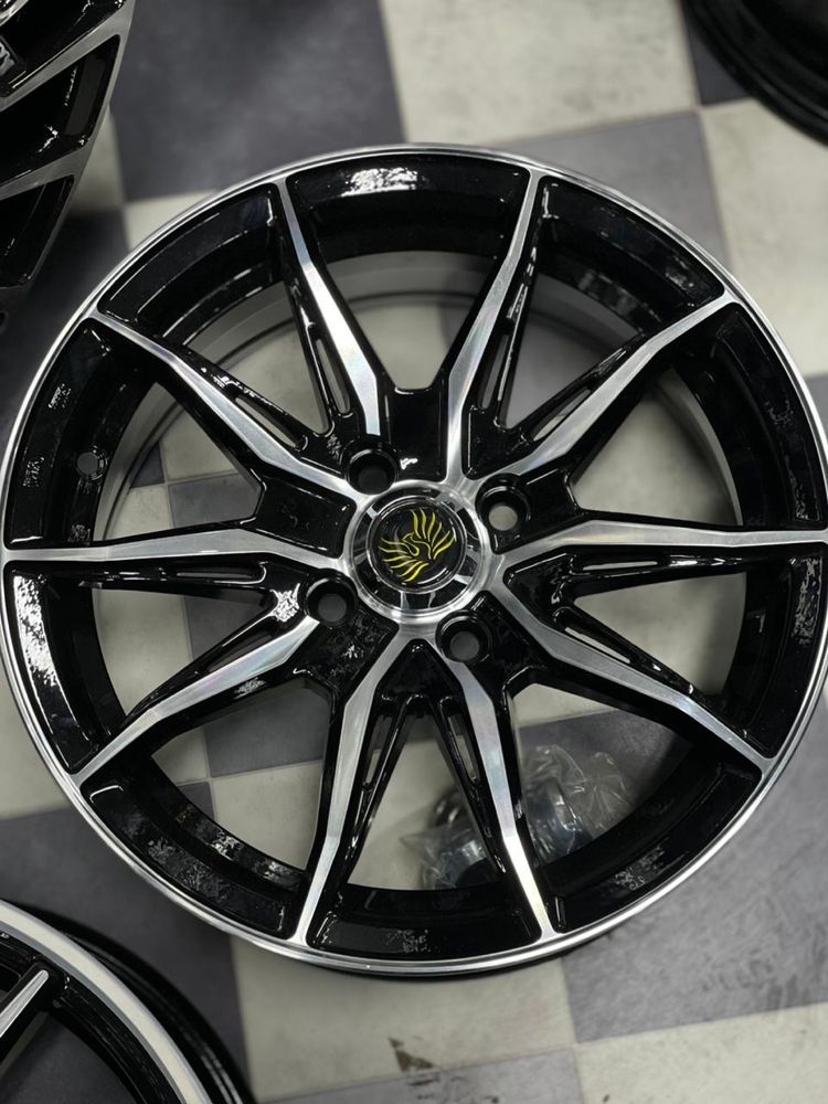 комплект новых дисков R15 4x100