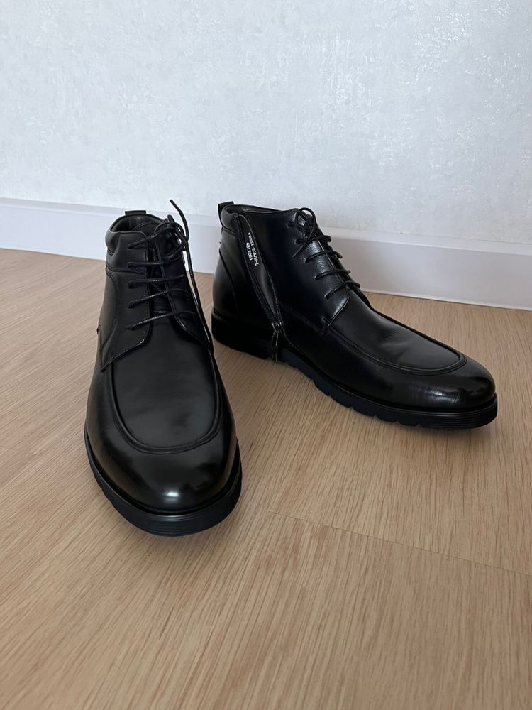 Продам новые зимние ботинки