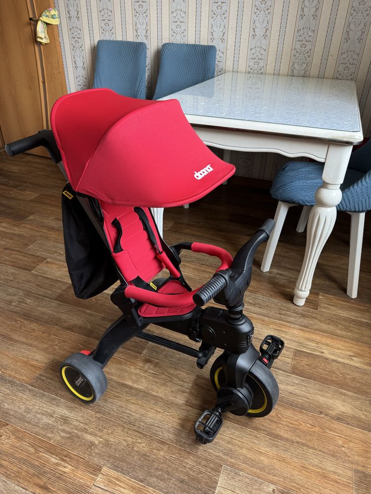 Продам Трёхколёсный велосипед Doona Liki Trike S3 красный