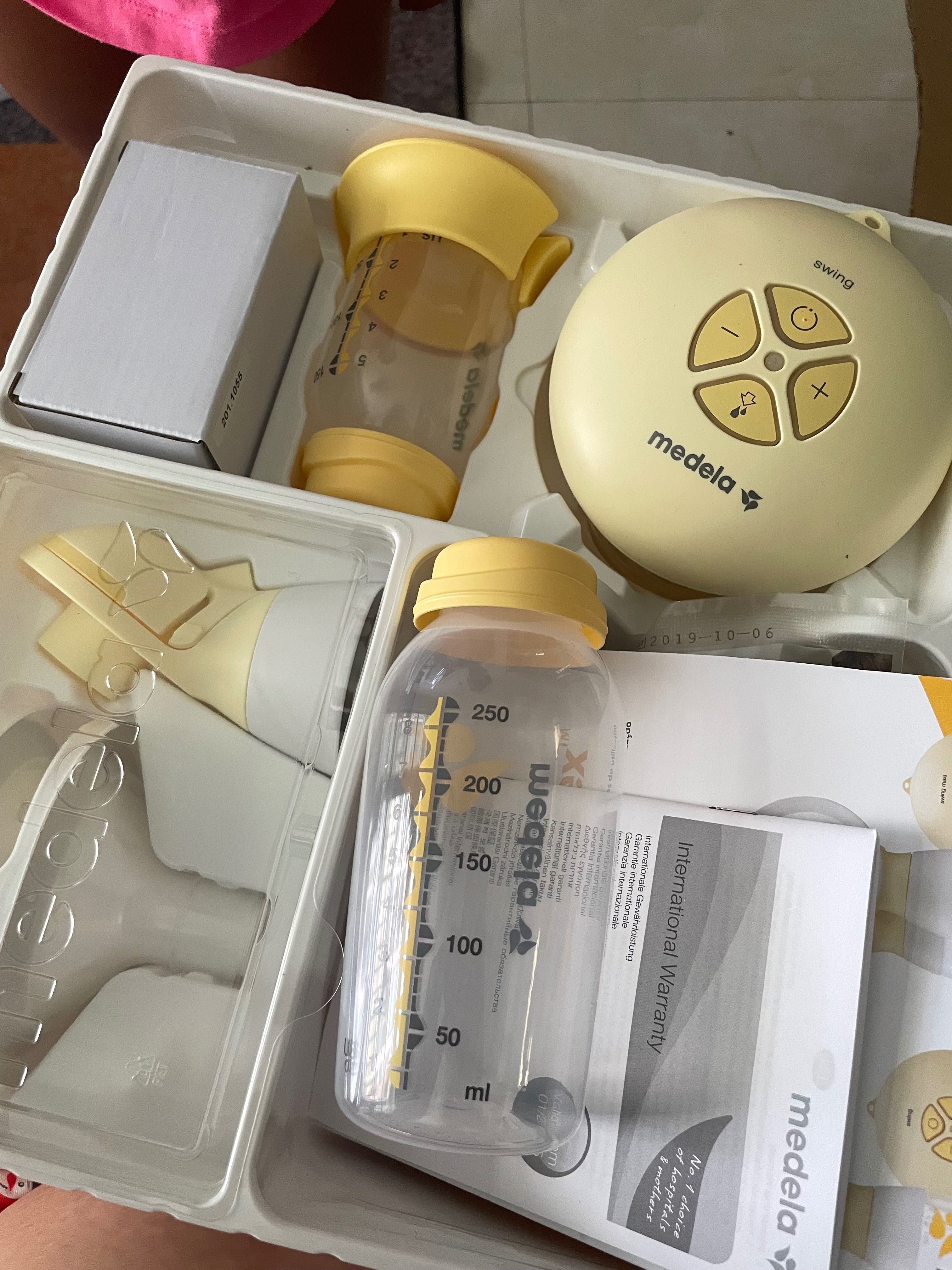 Электрический молокоотсос Medela
