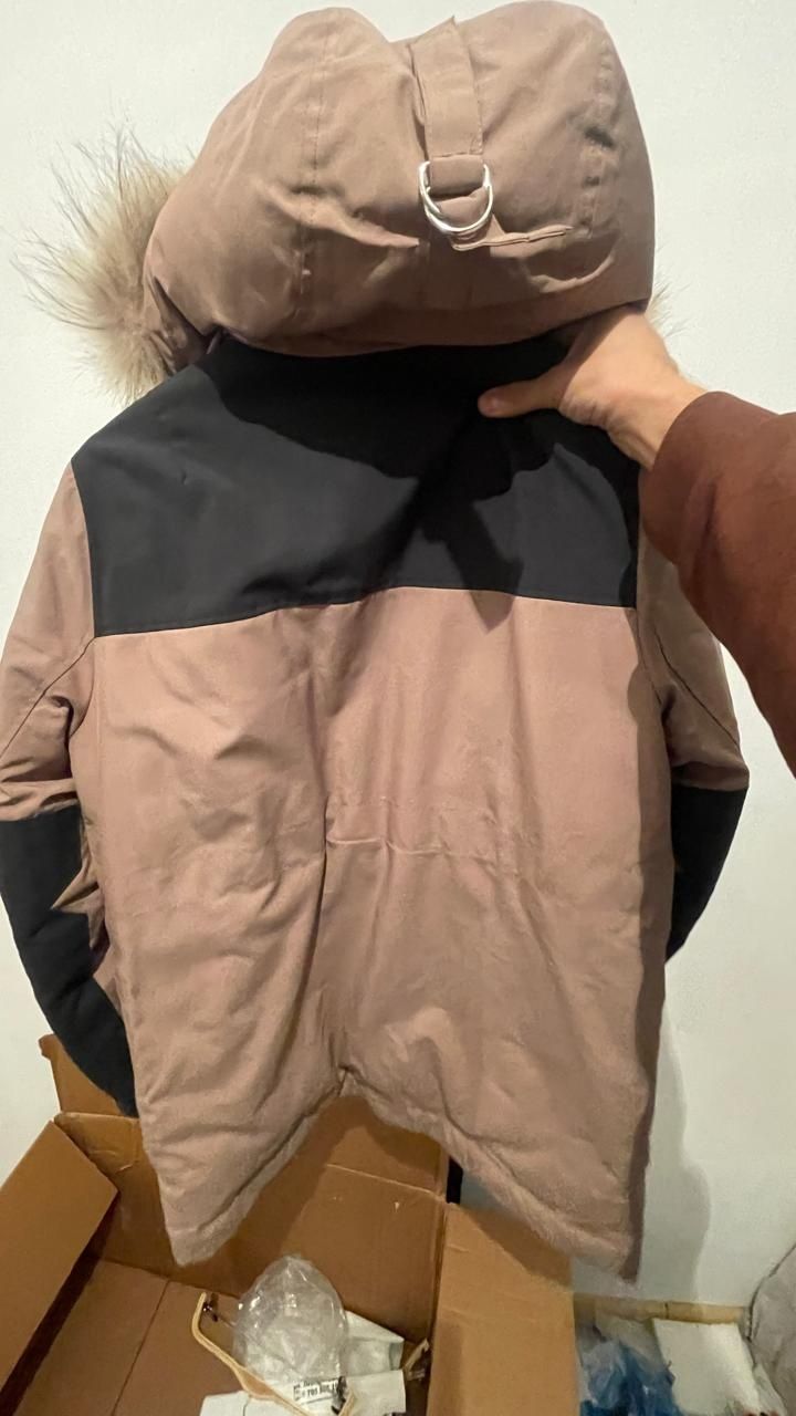 Продам пуховик lacoste