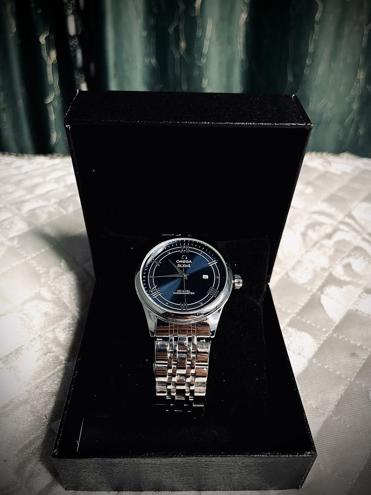Часы бренда omega