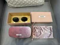 Солнцезащитные очки Miu Miu