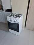 Газовая плита  Indesit с электрической духовкой