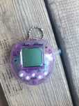 Электронный питомец Tamagochi