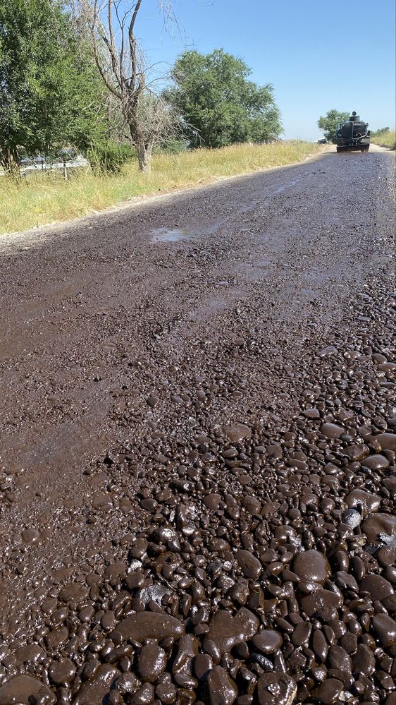 Асфальтирование дорог площадок, тротуаров,