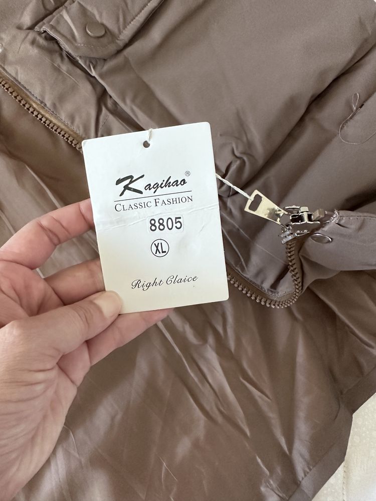Продам новую куртку