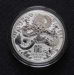 Серебряные монеты 1893 и 2022 гг.