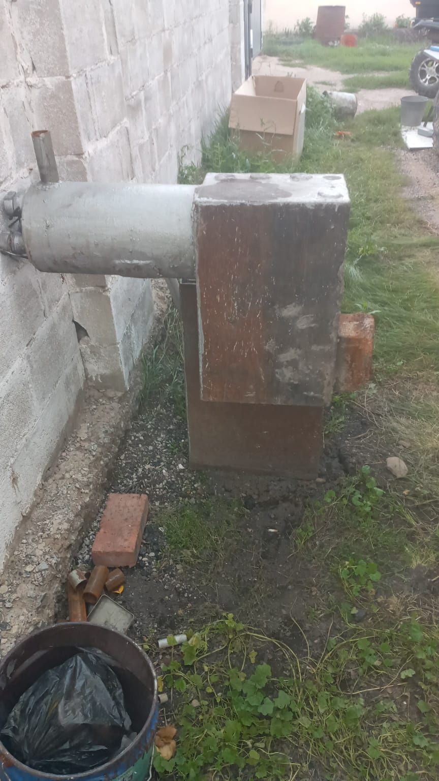 Твердотопливный котёл отопления
