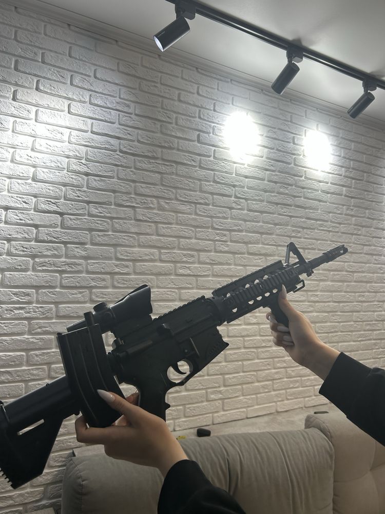 Игрушечный автомат с орбизами