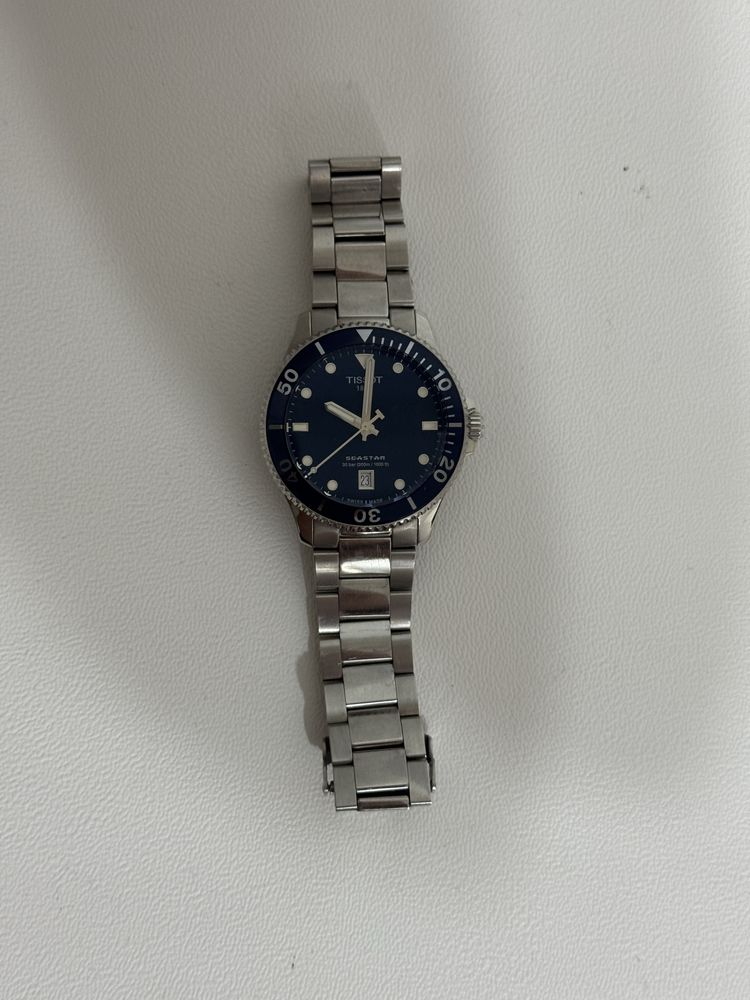 Tissot часы.