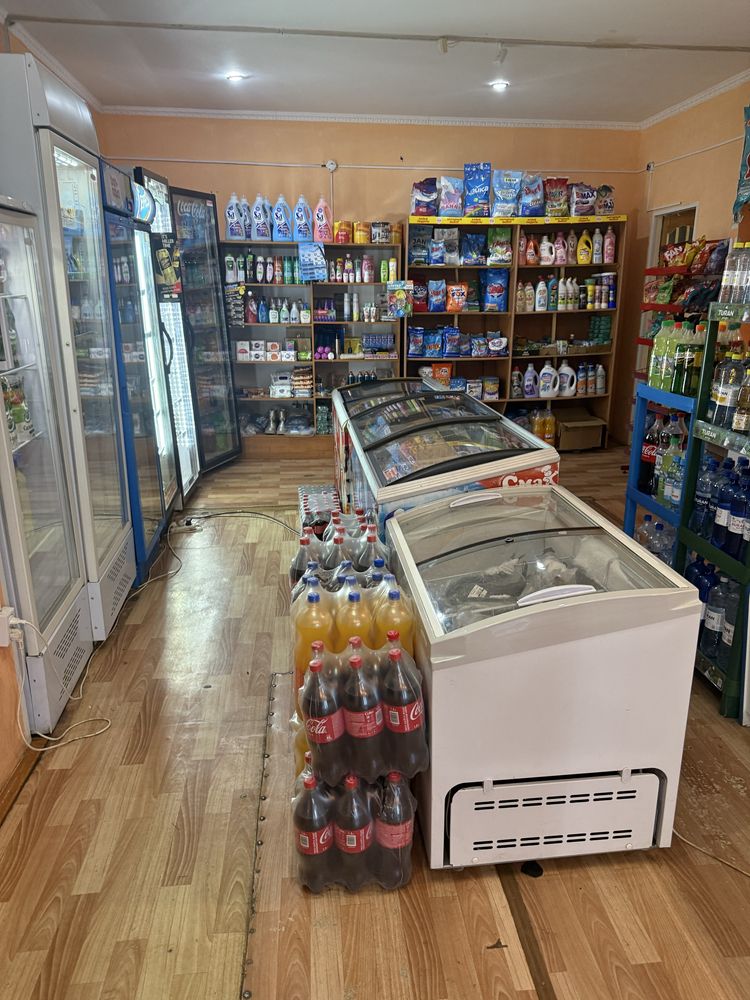 Продается действующий магазин в центре села Шарбакты