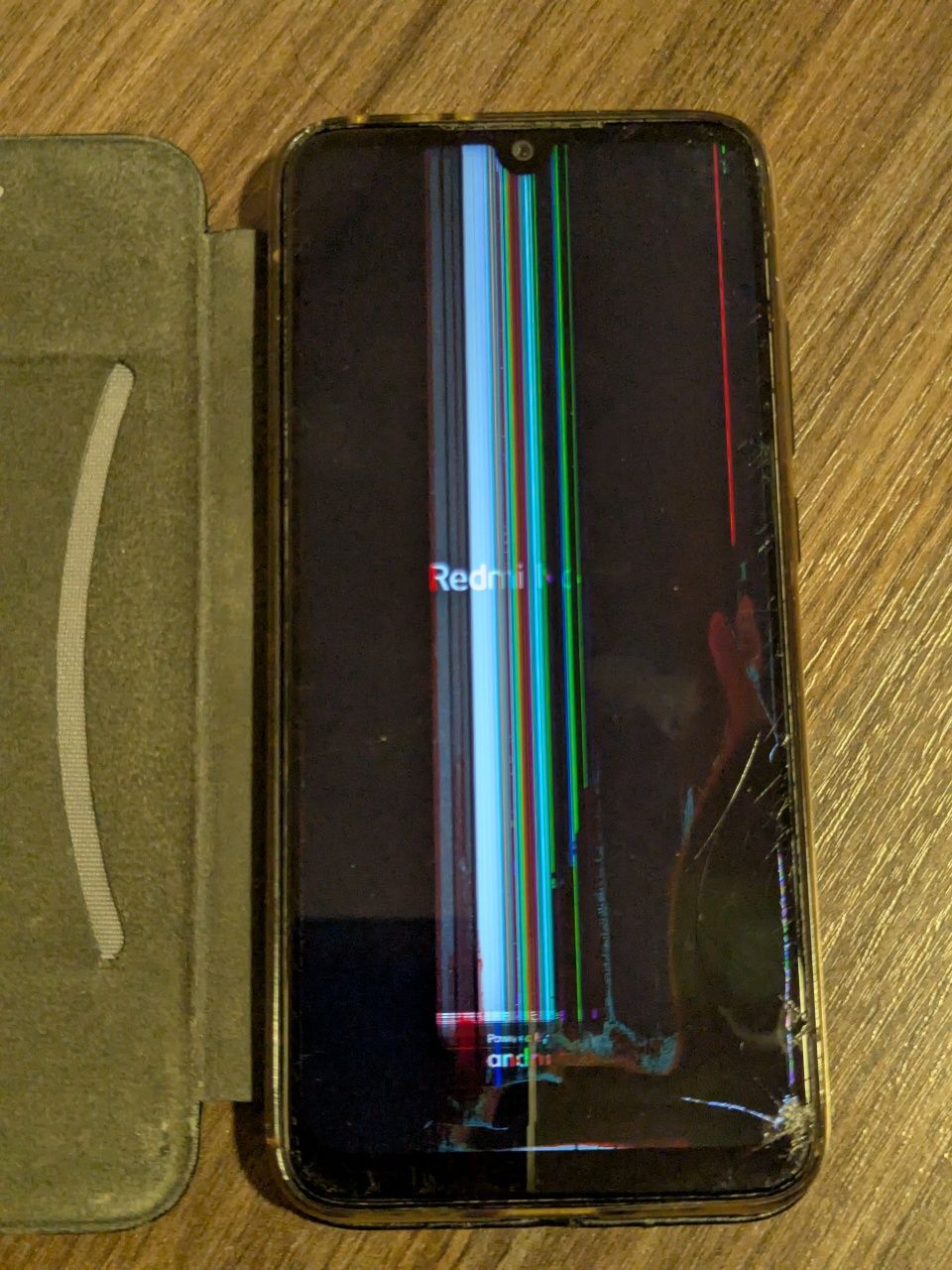 Redmi Note 7 с разбитыми стеклами.