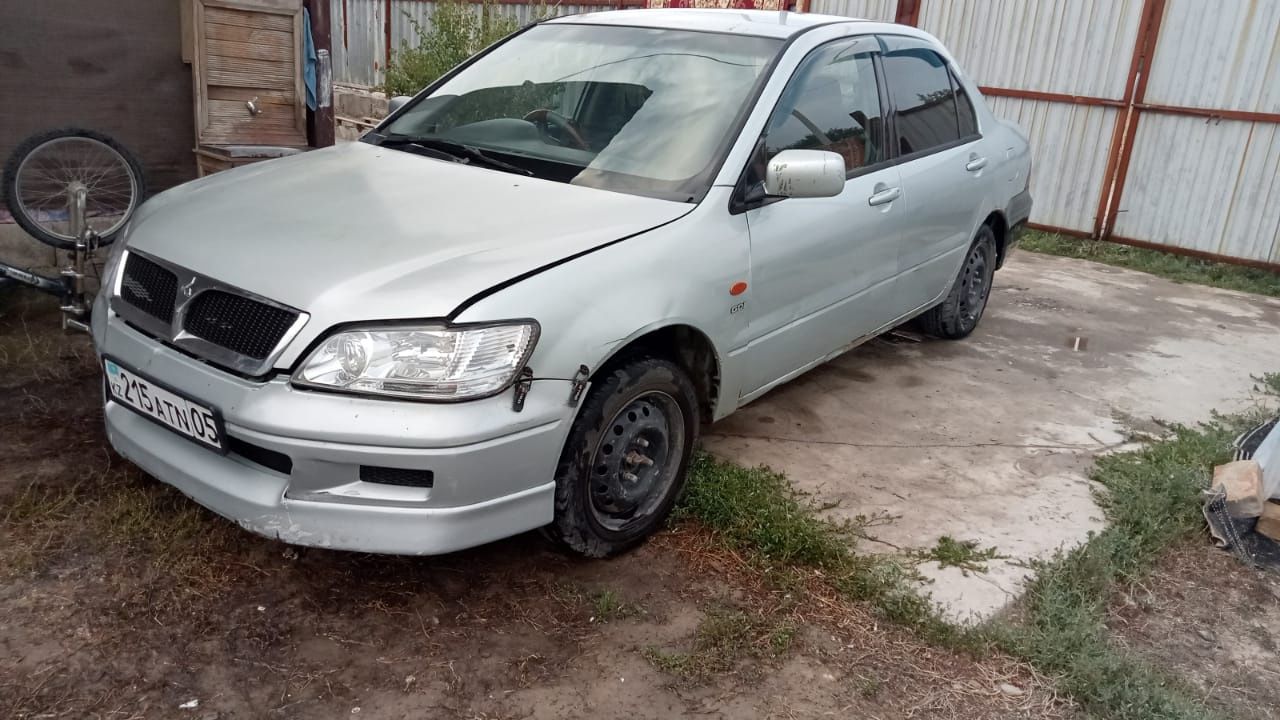 Продам Митсубиси Лансер