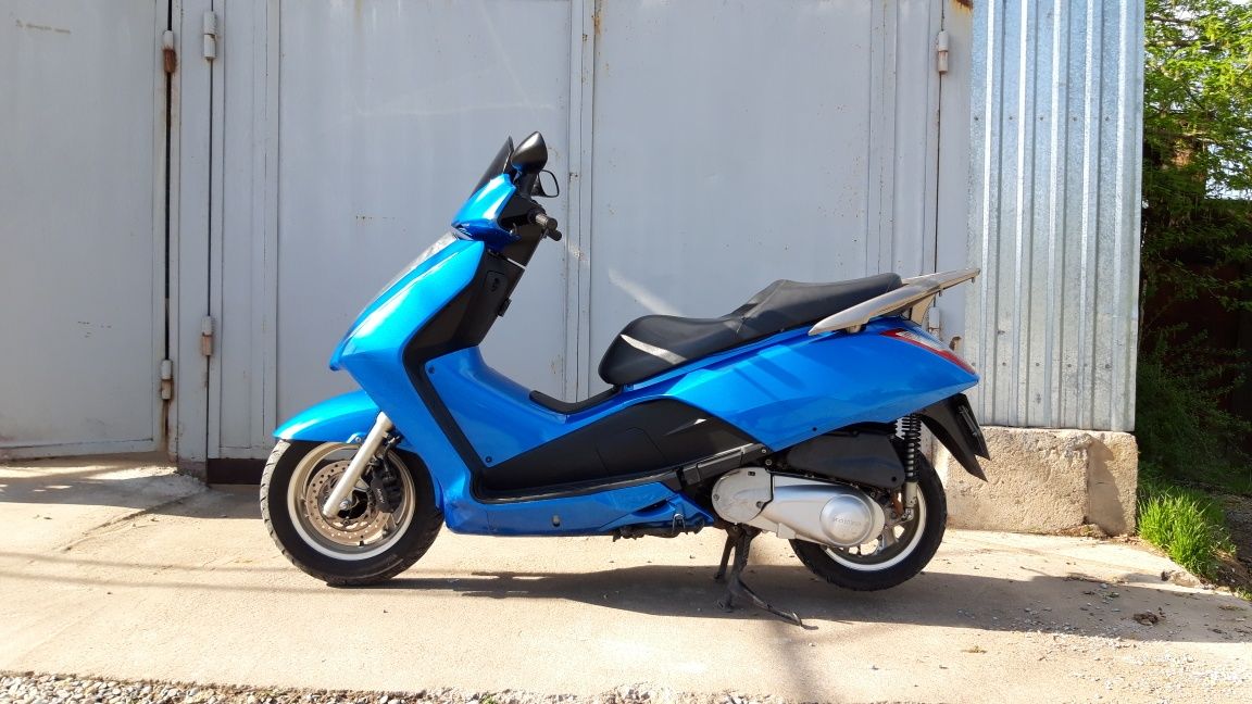 Скутер Honda pantheon