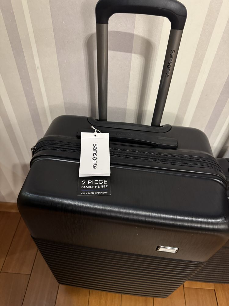 Комплект чемоданов SAMSONITE ( 2 чемодана в комплекте), новый.