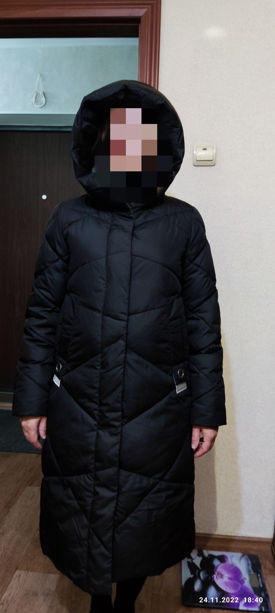 Продам пуховик..(новый)