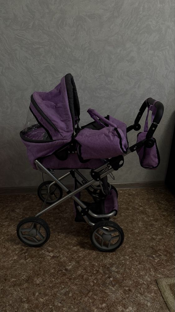 Продам игрушечную косяску