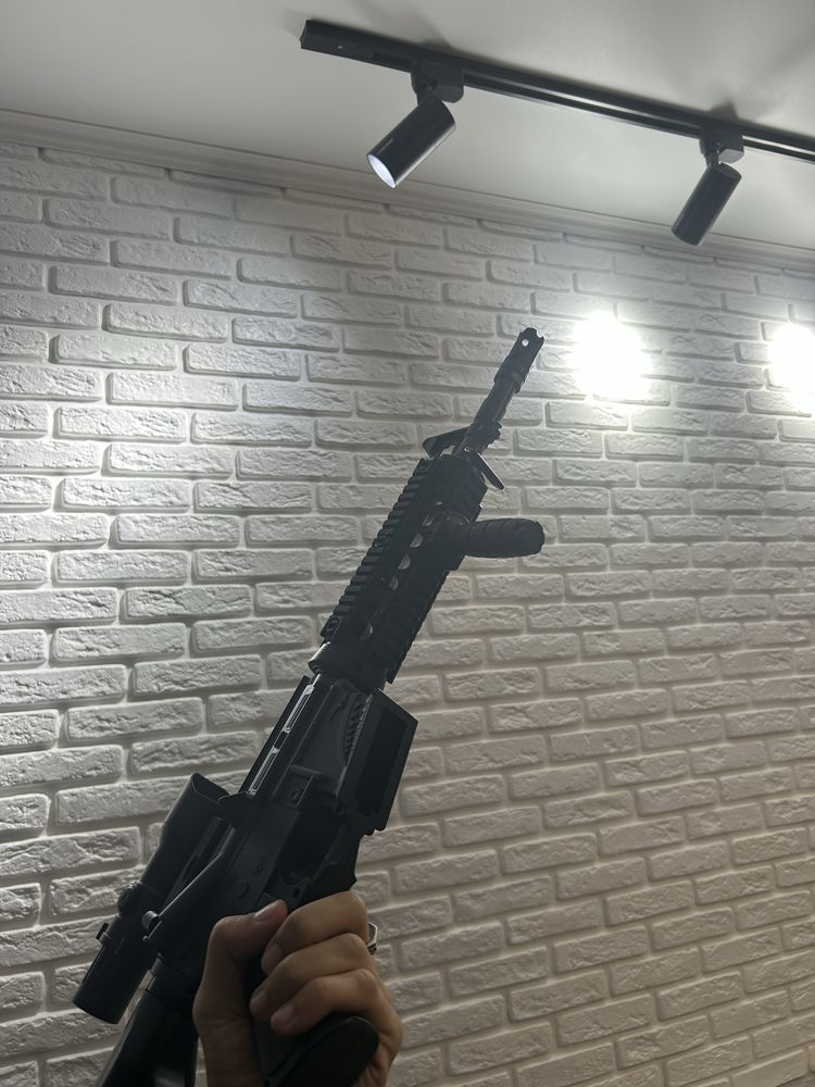 Игрушечный автомат с орбизами