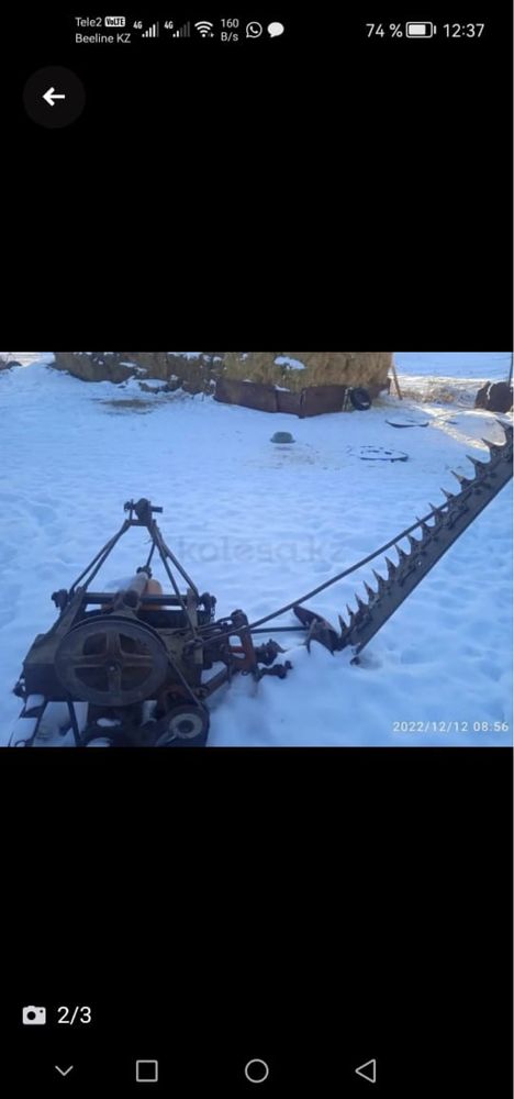 Трактор ЮМЗ с пресс подборшиком