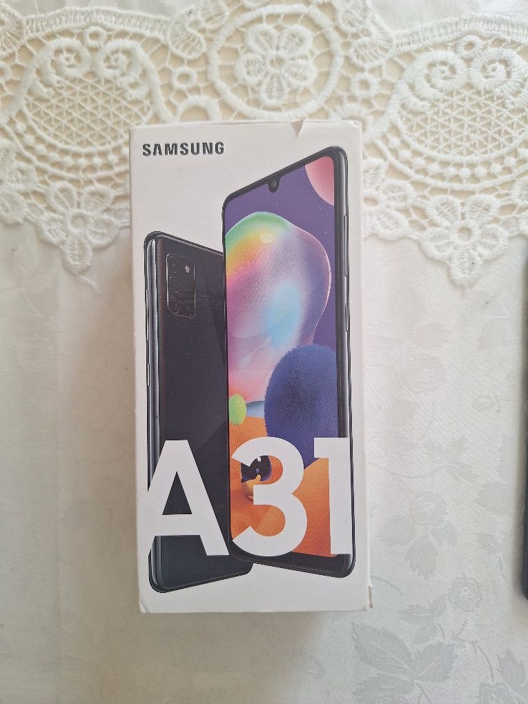 Продам смартфон Samsung a31 +каропка +чехлом