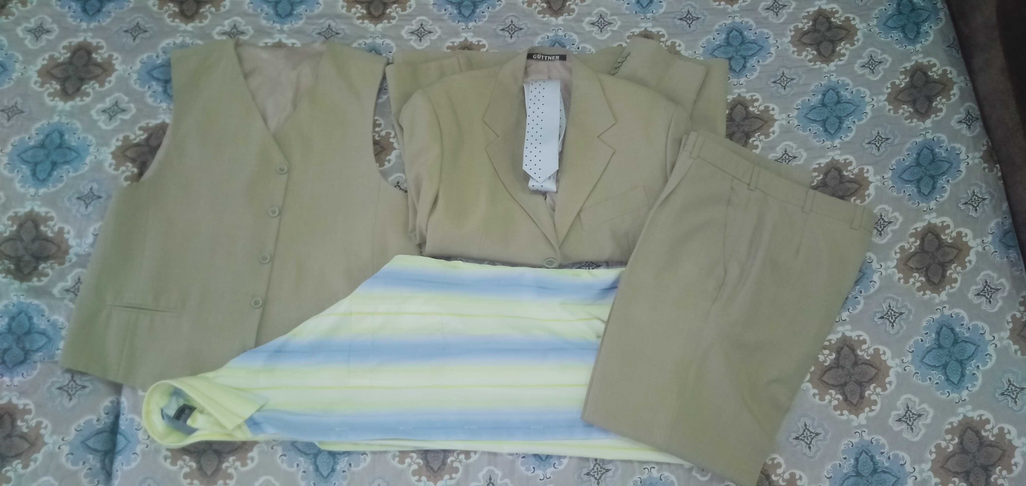 Продам мужские костюмы