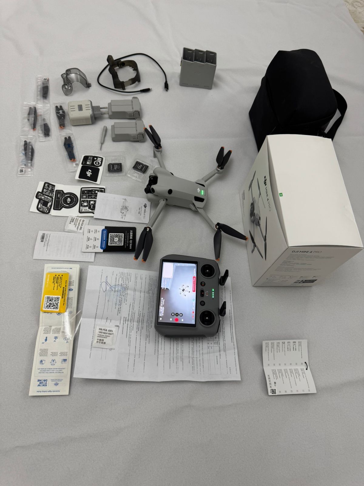 Дрон DJI Mini 4 Pro Fly More Combo Plus (DJI RC 2) белый