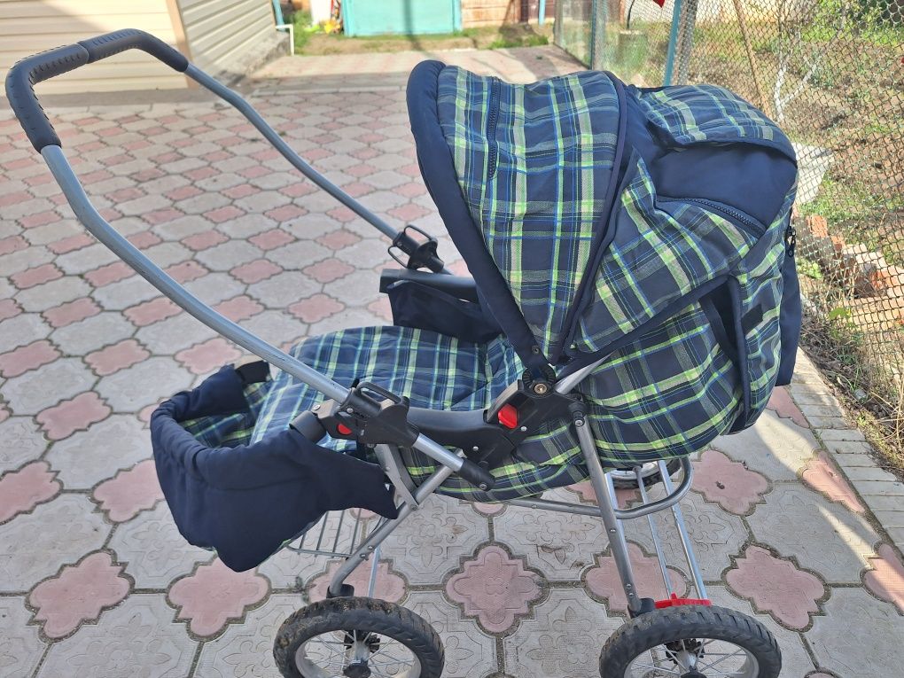 Срочно обменяю мощную детскую коляску на 3кг майского масла или продам