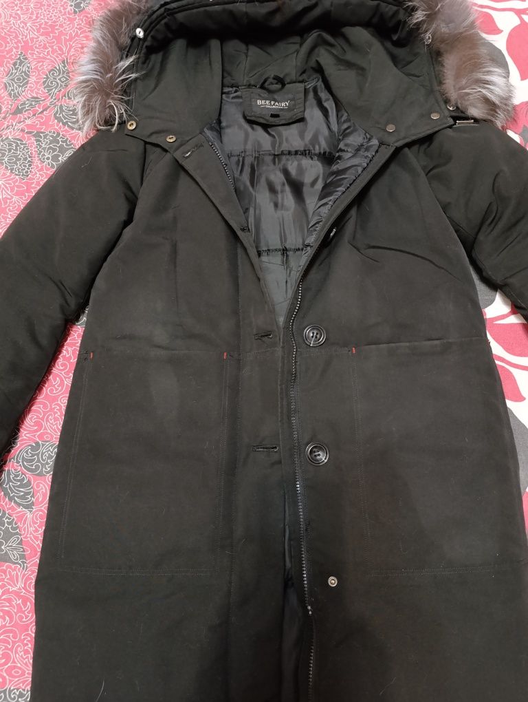 Продам женский зимний пуховик