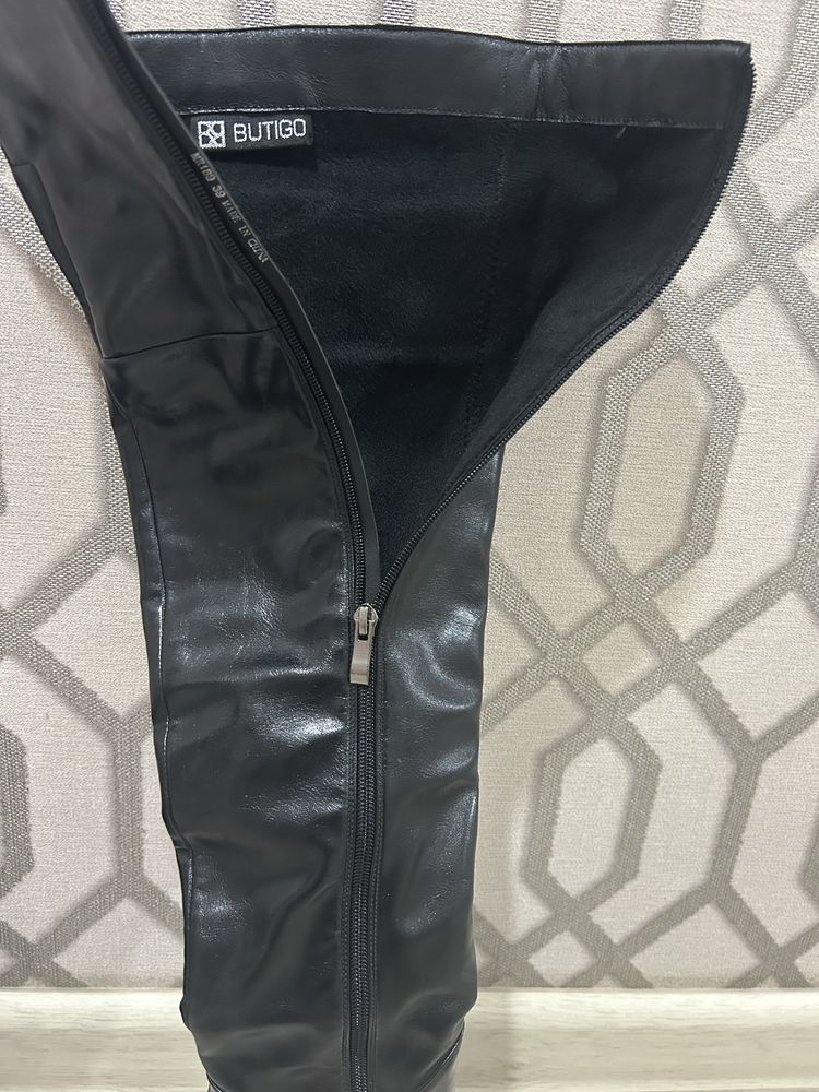 Продам красивые высокие сапоги  фирмы BuTiGo
