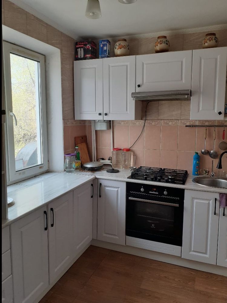 Продам 4 комнатную квартиру в центре