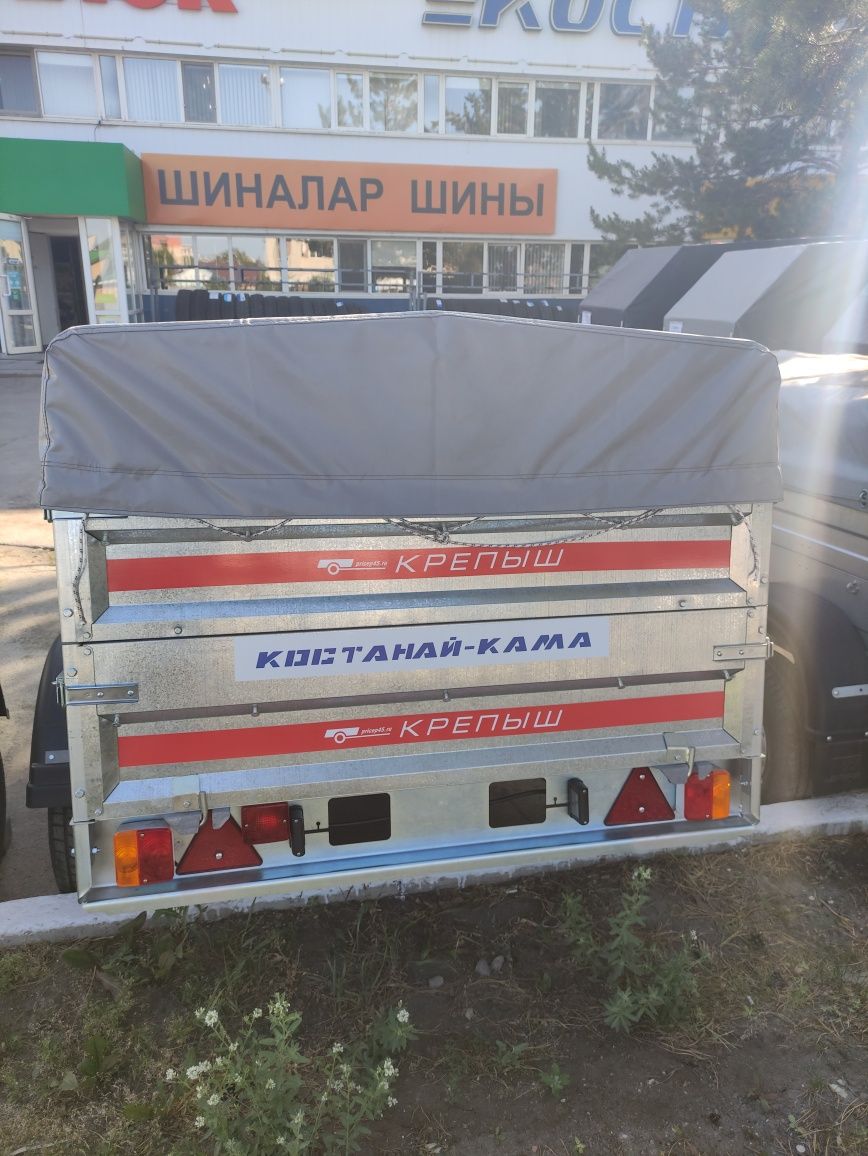 Курганский автоприцеп Крепыш 2 с доп. бортом и тентом 0.25
