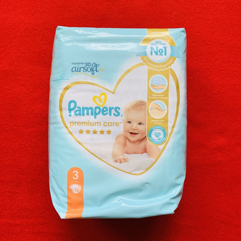 Подгузники и трусики Pampers premium care original в упаковке