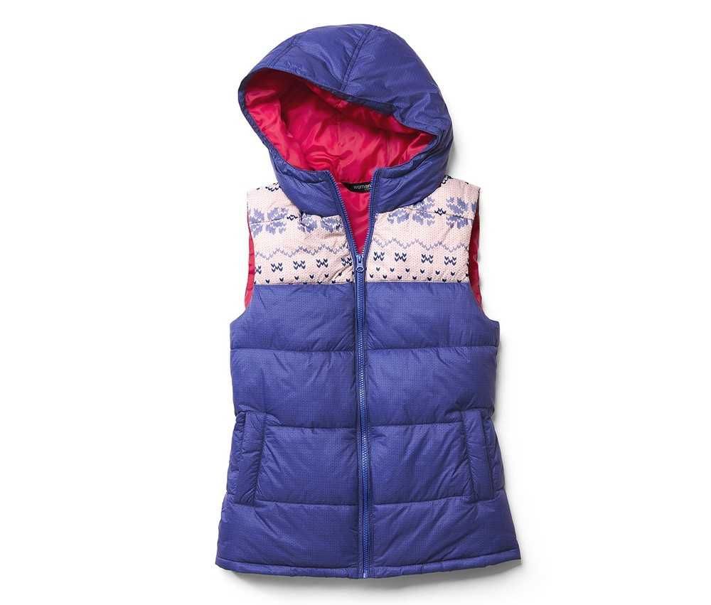 Продам новый женский фирменный жилет Outventure