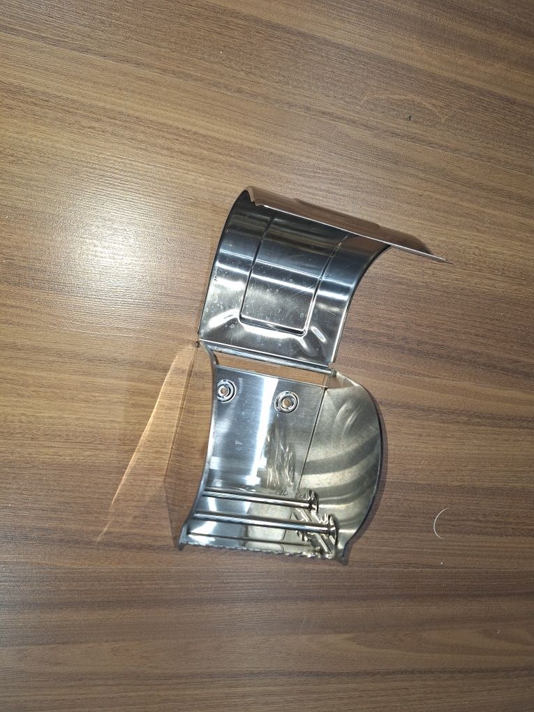 Держатель туалетной бумаги из нержавейки.