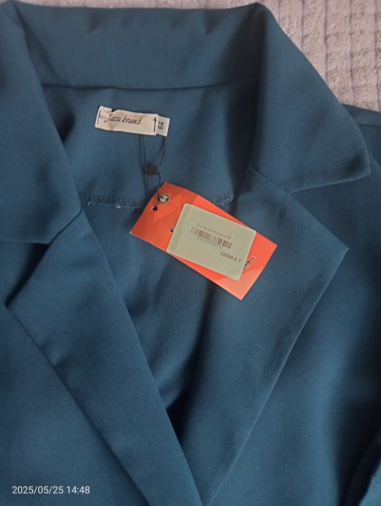 Продам женский костюм.новый