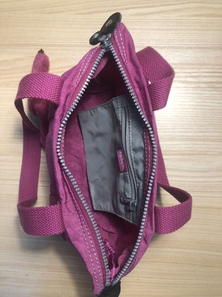 Малиновая сумка KIPLING