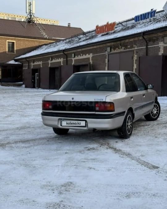 Продам машину Mazda 323