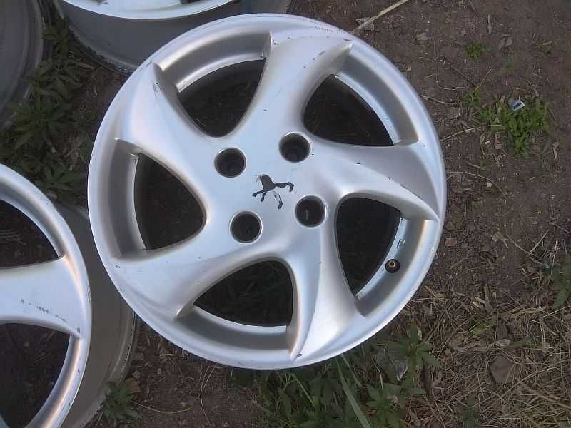 Продам легкосплавные диски "Peugeot Sirocco" на Peugeot 206