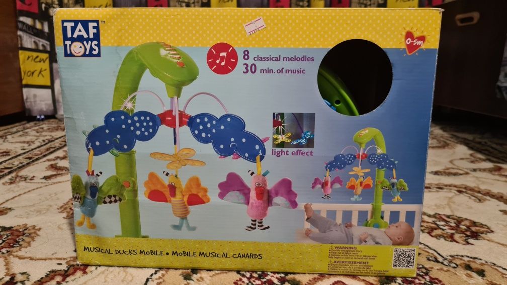 Музыкальный развивающий мобиль - это игрушка торговой марки TAF TOYS (