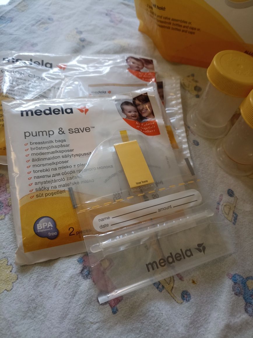 Молокоотсос Medela  ручной двухфазного сцеживания