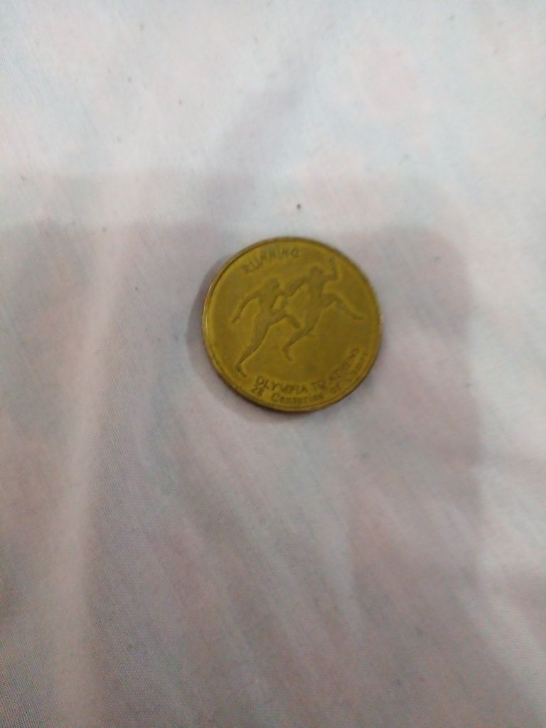 Монета с алимпийских игр