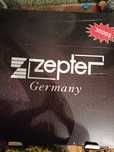 Продам набор кастрюлей новый фирмы Zepter