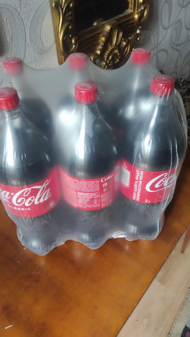Продам Coca-Cola,2 литра,две упаковки,12 бутылок,по 800 ТГ.