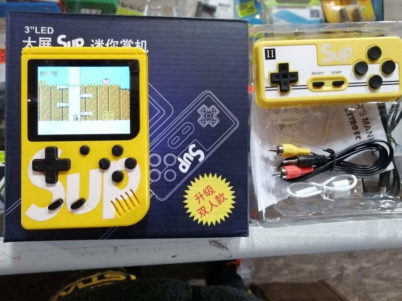 Портативная игровая приставка SUP Game Box со встроенными играми