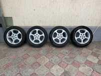 205/55R16 литние шины с дисками от nissan комплект