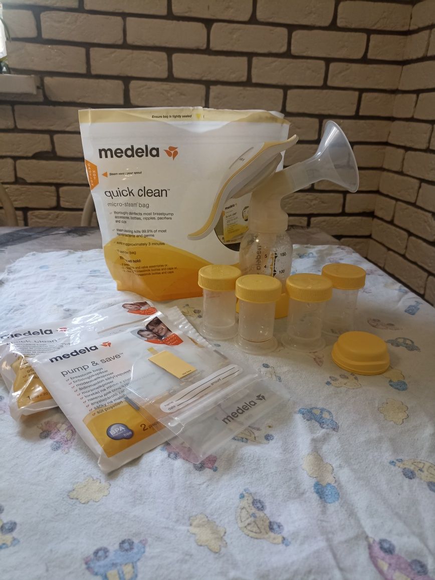 Молокоотсос Medela  ручной двухфазного сцеживания