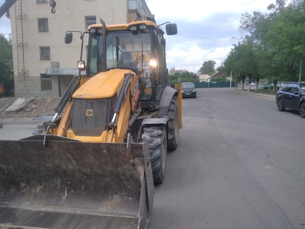 Услуги экскаватора - погрузчика и гидромолота