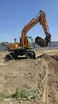 Услуги экскаватора Hyundai 140W Robex