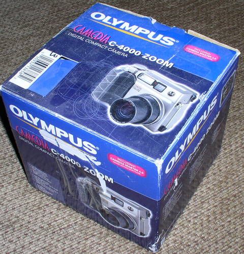 Olympus C4000 6,5-19,5мм F2.8 CCD 1/1,8 4,13 Mp